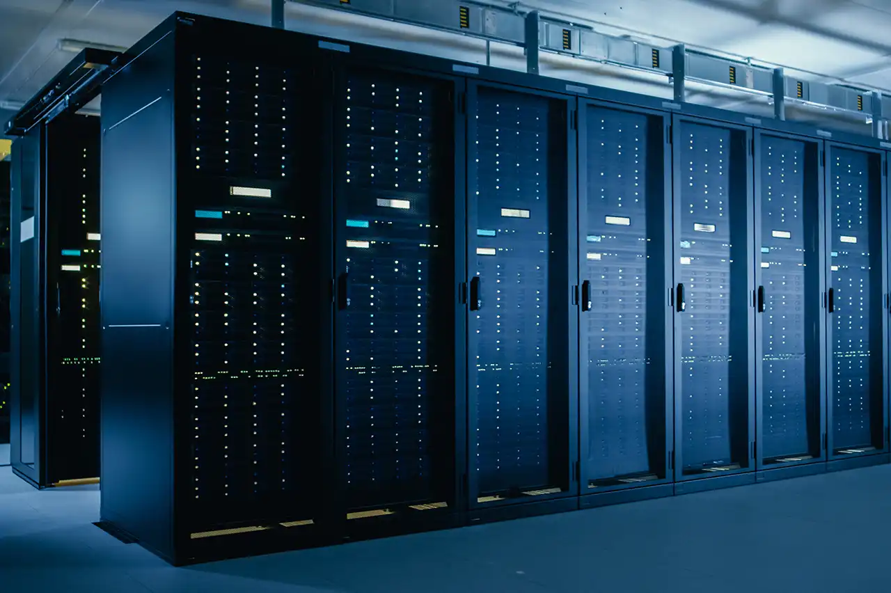 Rows of data center server racks with indicator lights